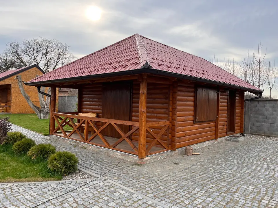 Log house in a landscaped garden