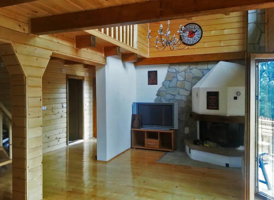 Interior with a fireplace and dining area
