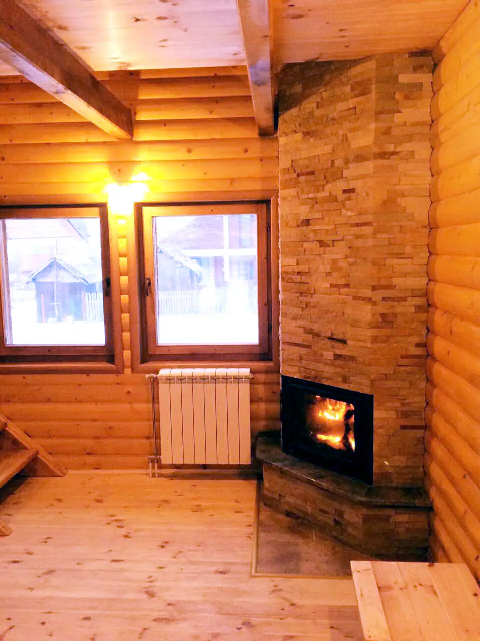 Fireplace in a log house