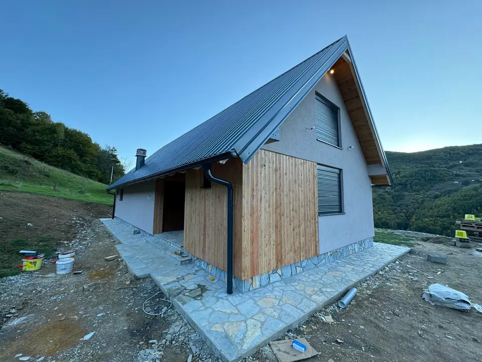 House with timber cladding on the gable