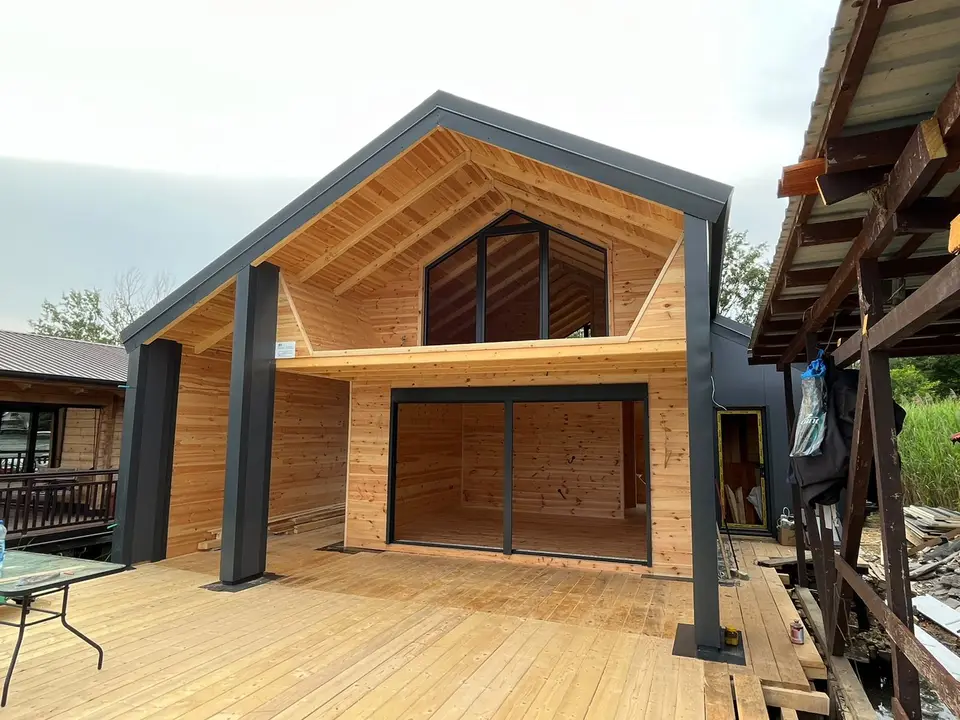 Modern timber house with a steel frame