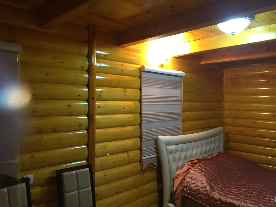 Bedroom in a log house